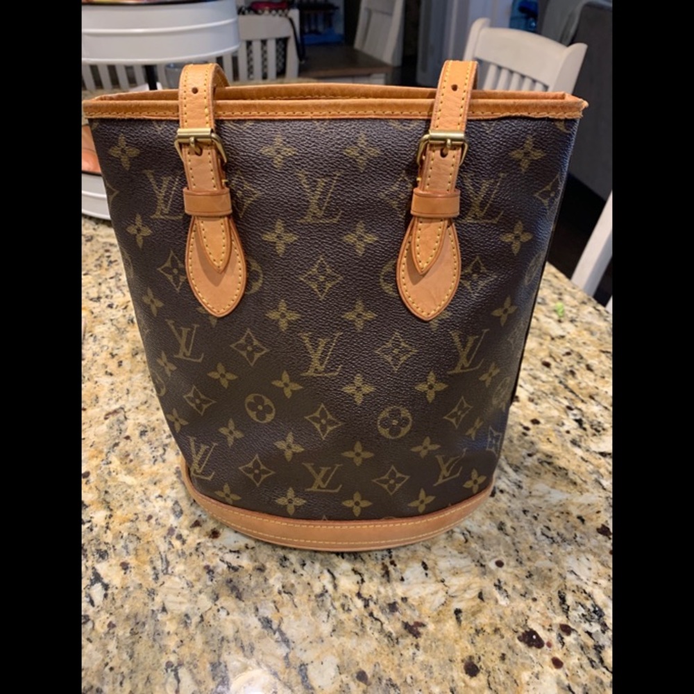 Louis Vuitton petite monogram bucket bag.